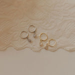 Load image into Gallery viewer, April Raindrop Dangle Hoops
