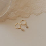 Load image into Gallery viewer, April Raindrop Dangle Hoops

