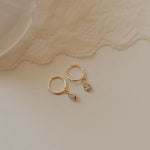 Load image into Gallery viewer, April Raindrop Dangle Hoops
