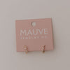 Pink jewelry card with 'MAUVE JEWELRY CO' on a light gray background featuring diamond and gold hoop earrings